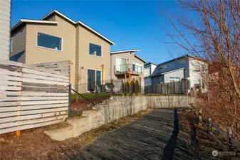 The home borders a short, community walking trail.