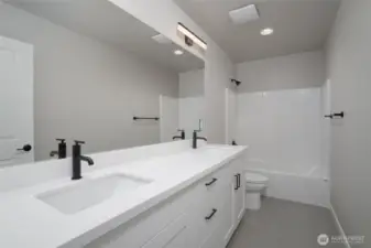 Photos are of another home in the community and are for illustration purposes only to reflect typical finishes.  May depict seller enhancements.  Colors and options may vary.
