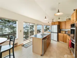 Slider in the middle is good for entertaining.  From kitchen right out the sliders to the deck.