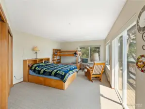 Bedroom with it's own slider to the deck.