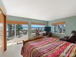 View from primary bed out to private deck.