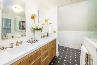 No expense has been spared when remodeling this primary ensuite bathroom.  Extensive care and thought when choosing fixtures, Robern recessed medicine cabinets, heated floors and Willow bath vanities.  Just around the corner is a new in-wall Toto mounted toilet with integrated Bidet