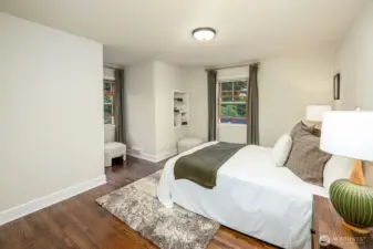 Second of two additional top floor bedrooms. This bedroom has beautiful city views and a cute built in book shelf.