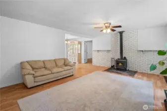 The wood stove and brick hearth keep the home warm in winter months.