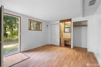 The bonus room features a thoughtful built in vanity and dual closets with bifold doors.