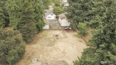 Back part of the property is a flat area and 118 x 100 ft.
