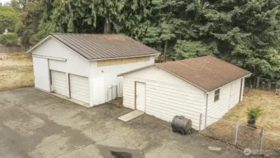 The garage/shop on the left is 20 x 30 and the smaller one on the right is 20 x 25.