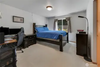 The second guest bedroom is large enough for a king-size bed, dresser, and working desk.  Awesome!