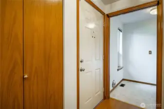 Entryway. Laundry room in the background