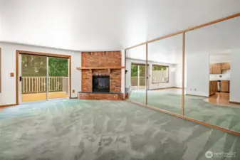 Living room leading to large deck