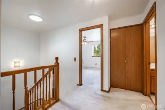 Landing upstairs. Bedroom #1 in the background, full bathroom to the right