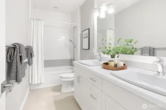 Two full baths plus 3/4 bath on upper level.