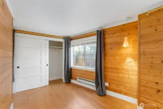 Double door closet in primary bedroom.