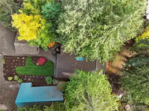 Tucked away in the woods with new and mature landscaping.