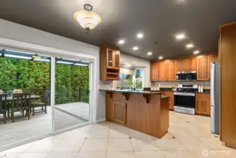 WIFI and voice-enabled thermostat controls radiant heated floors in kitchen, creating warmth and comfort - perfect for chilly mornings.