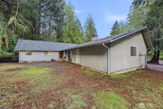 The white door is access to the garage, the slider leads to the family room, and the brown door provides entry to the laundry room--each one with its individual benefits and convenience!