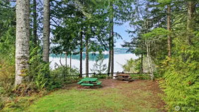 Picnic overlook, with secure, gated trailhead to beach on the right just behind camera.