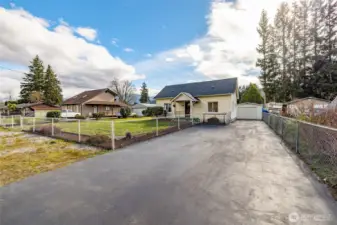 View from Street- Huge paved Driveway!