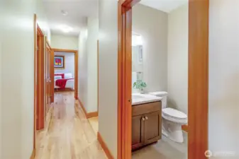 Hallway connecting bedrooms and bathroom