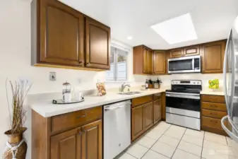 Solid wood cabinetry, new stainless steel appliances, LED lighting