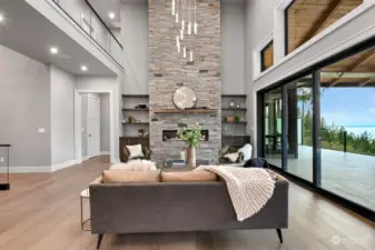 Light-filled living room with 21 foot ceilings.