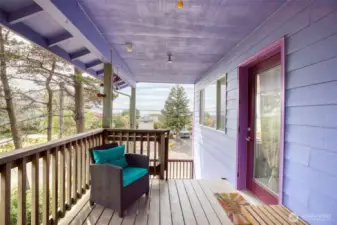 Covered deck (composite) with ocean in background.