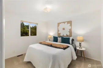 Bedroom #2 with closet and window coverings