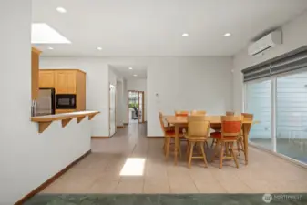 The dining room is large and this table (negotiable) can see eight easily with more seating available at the eating bar.