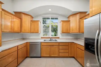 There is a lot of cabinet storage space in the kitchen.