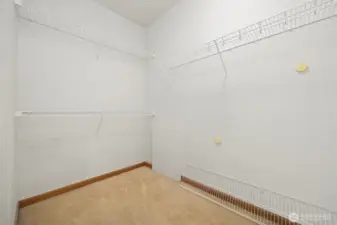 The walk-in closet is very large.