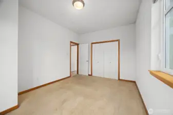Looking across the 2nd bedroom toward the hallway.