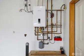 The radiant heating system has an on-demand hot water tank.
