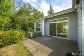 This patio is private and looks toward the greenbelt.