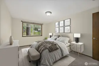 Virtually staged primary bedroom. Very spacious