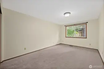 Primary bedroom looking towards the front yard