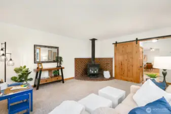 Barn door to the bonus room offers privacy and potential for office, or extra bedroom