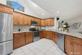 Natural light from the large windows and skylight.