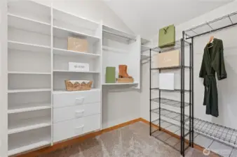 Walk-in closet in primary suite.