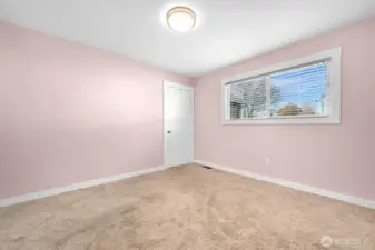 Second upstairs bedroom with large walk in closet.