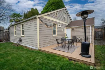East side of home with door leading to garage.