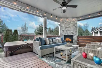 This private deck is made for unforgettable moments. Manual roll shades set the mood, offering comfort and seclusion, while the gas fireplace adds warmth and ambiance year-round. A mounted 70-inch TV makes it the ultimate spot to soak in the hot tub and catch the big game, relax with friends, or wind down after a long day. This is more than a deck, it’s a memory-making retreat where countless good times are waiting to happen.