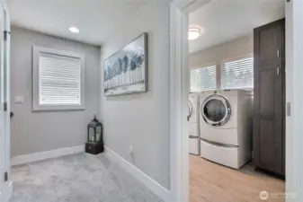 Moving upstairs, the furnace is tucked neatly in the closet to the left, leaving extraordinary space throughout the floor, storage is never in short supply. The large laundry room is equally impressive, featuring a conveyed washer and dryer, ample storage, and a deep sink, making chores effortless and organized.