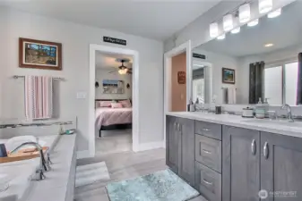 This 5-piece master suite highlights the beauty and craftsmanship of the home. Elegant tile finishes perfectly frame the space, adding sophistication and a polished, luxurious feel that makes this suite a private sanctuary.