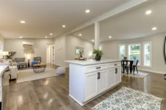 Kitchen island with seating and storage just off the dining room.