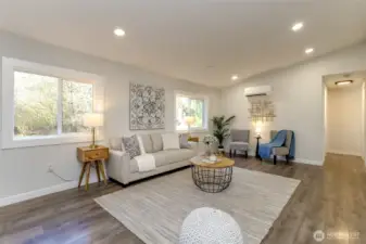 Family room overlooks the backyard. Ductless mini splitter for heating and AC year round.