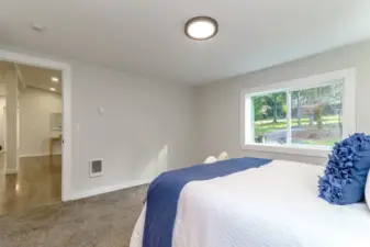 Primary with view of the front yard and Shadowbrook Dr SW.