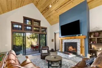 Great Room with cozy fireplace and t&g ceiling