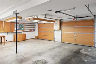 Spacious two car garage with workshop and storage