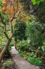 Pathways traverse through the lush gardens and grounds.