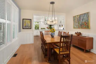Spacious formal dining between the living room and kitchen.